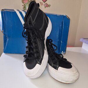 Adidas Nizza Trek Black and white Platform hi top canvas sneakers.